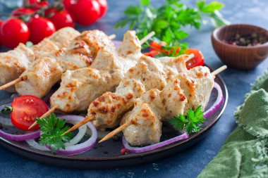 Chicken breast kebab in the oven on skewers