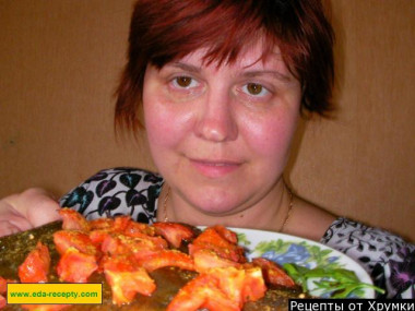 Flounder fish baked with tomatoes in the oven