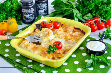 Dumplings baked in the oven with mayonnaise and milk