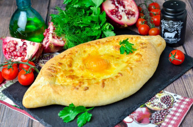 Adjarian khachapuri with suluguni cheese in oven