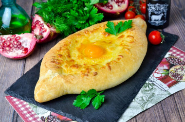 Adjarian khachapuri with suluguni cheese in oven