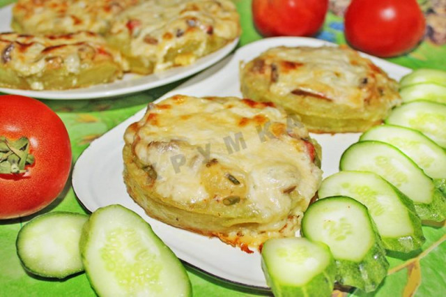 Zucchini stuffed with mushrooms in the oven