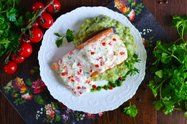 Pink salmon baked with cheese in the oven