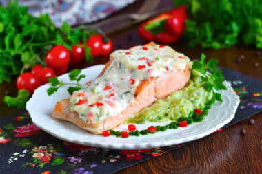 Pink salmon baked with cheese in the oven