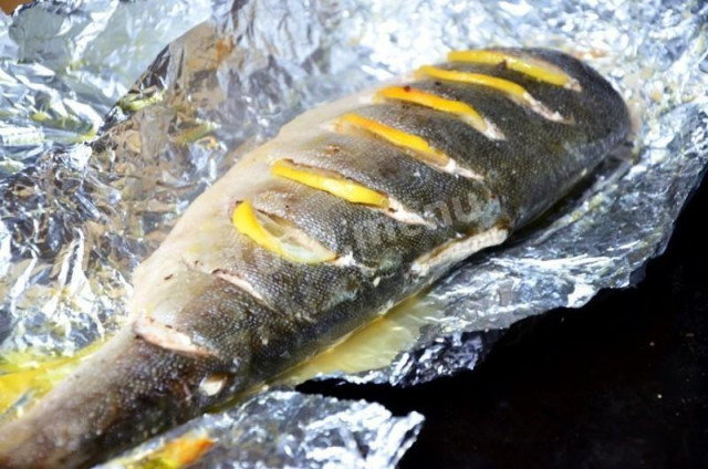 Juicy pink salmon in foil in the oven