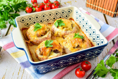 Stacks of minced mushrooms with cheese in the oven