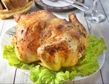 Chicken with garlic in the oven with a whole crust