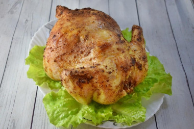 Chicken with garlic in the oven with a whole crust