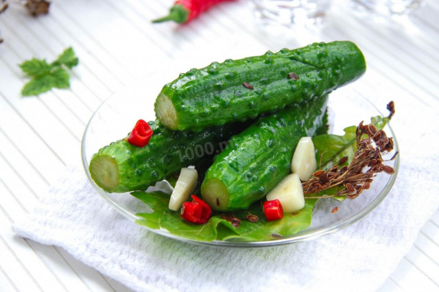 Cucumbers are lightly salted in a saucepan cold method