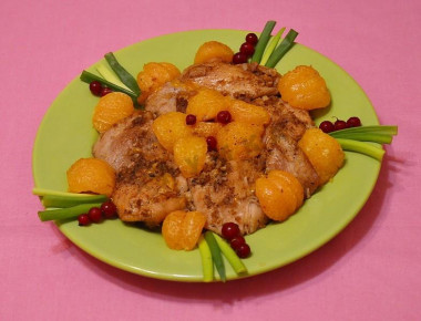 Chicken with tangerines in the oven