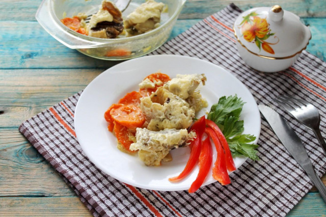 Pollock with mayonnaise carrots and onions in the oven