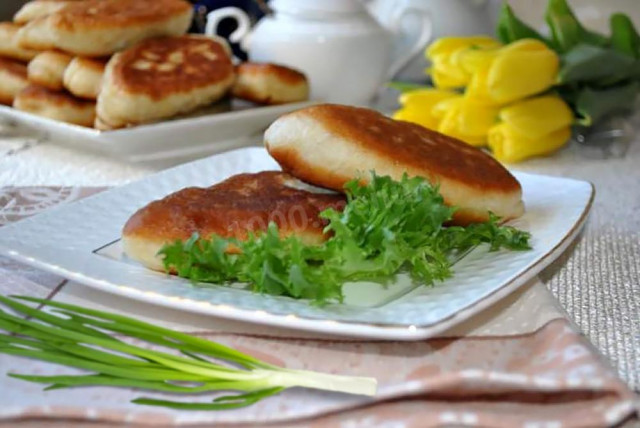 Liver pies fried in a frying pan