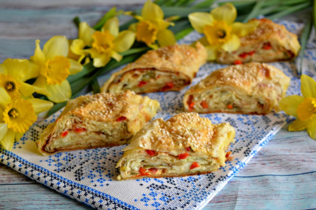 Lavash with cottage cheese and melted cheese in the oven