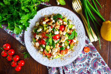 Salad with canned white beans, cucumber and chicken