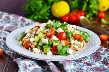 Salad with canned white beans, cucumber and chicken