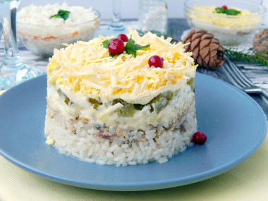 Salad with rice and canned fish layered