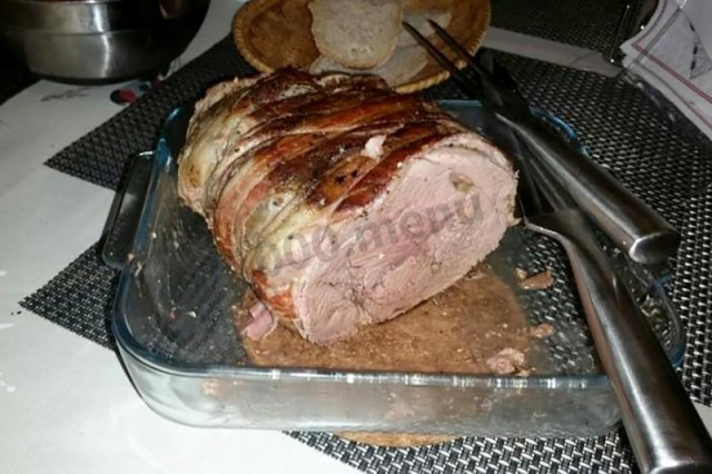 Moose meat with bacon in the oven