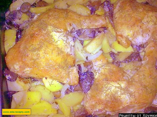 Chicken legs with potatoes and mushrooms in the oven