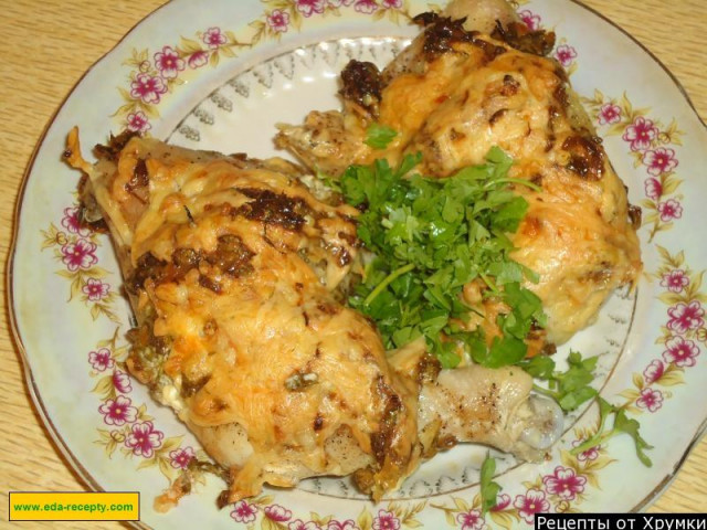 Chicken thighs with cheese baked in the oven