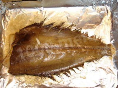 Halibut with carrots and onions in the oven