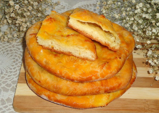 Khachapuri with cheese from yeast dough