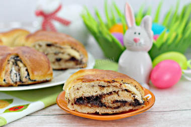 Easter roll with meringue, chocolate and nuts