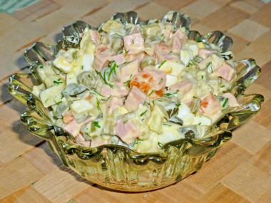 Olivier salad with pickles and sausage classic