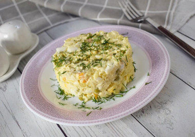 Olivier salad with chicken and cucumber