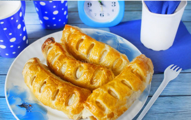 Sausages in the dough from the finished dough in the oven