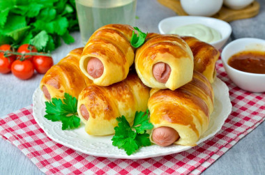 Sausages in kefir dough in the oven