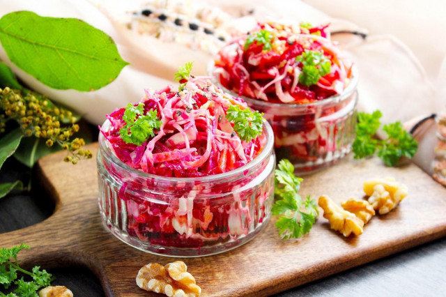 Health salad with carrots beetroot cabbage and yogurt