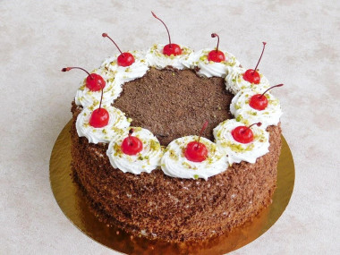 Chocolate cake with cherries and sour cream