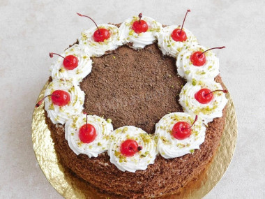 Chocolate cake with cherries and sour cream