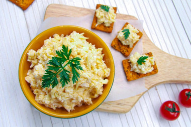 Cheese salad with garlic, egg and mayonnaise