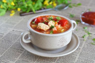 Soup with rice, tomato paste and chicken