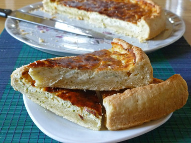 Pie with melted cheese and onions