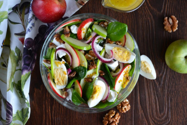 Salad with apples and cheese,  eggs with onions and nuts