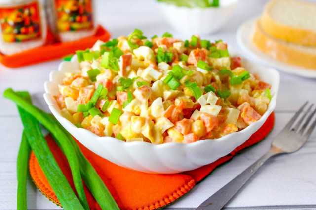 Salad with carrots, crab sticks and egg