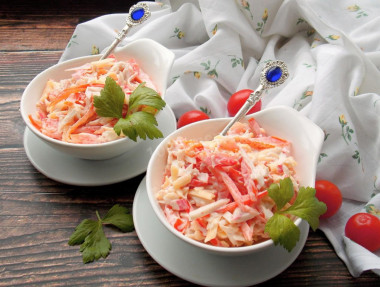 Salad with bell pepper, crab sticks and tomatoes