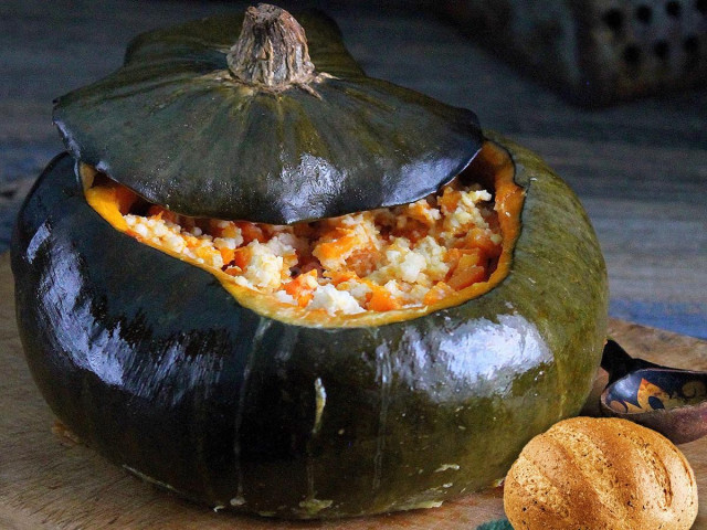 Millet porridge in pumpkin on water