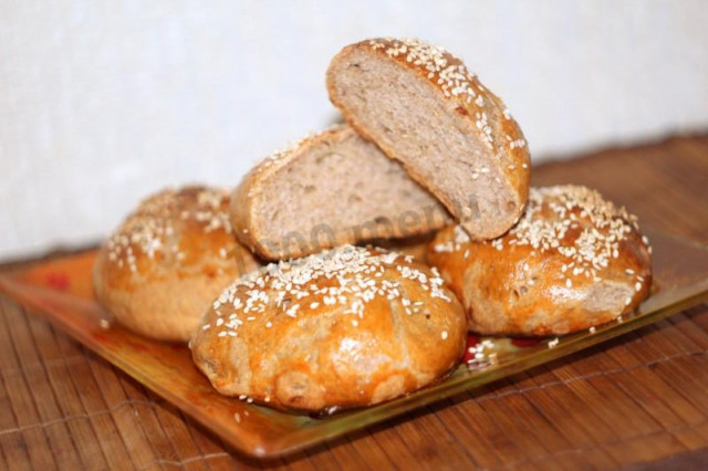 Rye flour dough rolls with onions