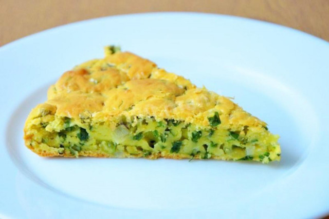 Aspic pie on sour cream with green onions mixed into the dough