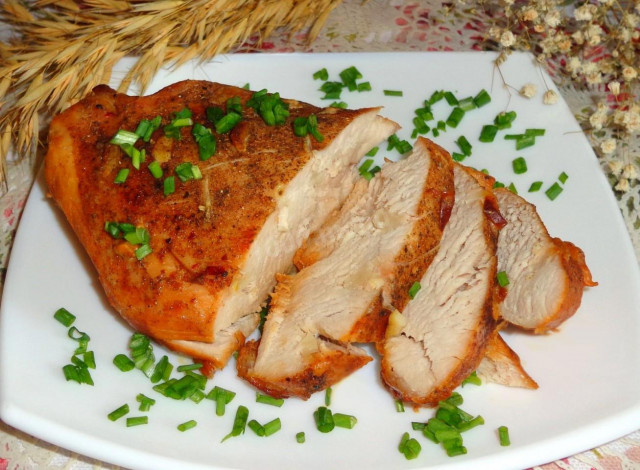 Whole turkey fillet baked with garlic and spices