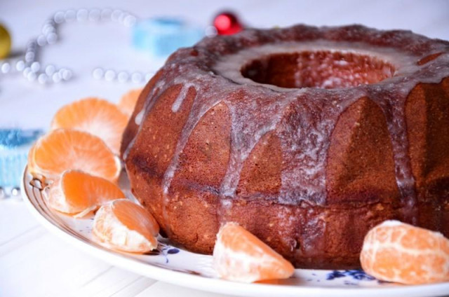 Tangerine cupcake with cream and butter