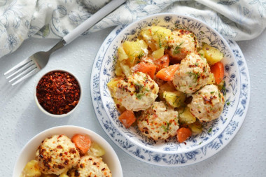 Chicken meatballs in cream sauce with potatoes