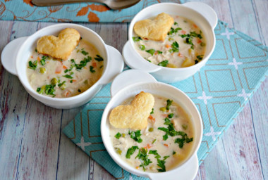 Chicken soup with puff pastry hearts