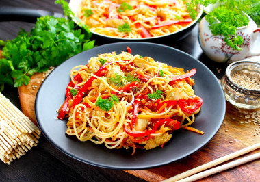 Udon noodles with chicken teriyaki sauce and vegetables