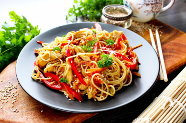 Udon noodles with chicken teriyaki sauce and vegetables