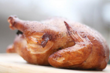 Bottle-baked chicken with lemons and rosemary