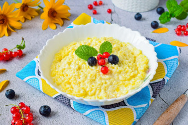 Milk millet porridge in a saucepan